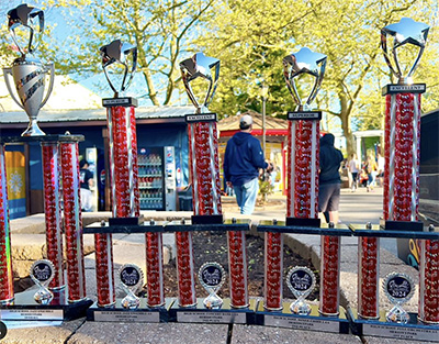 Row of 4 trophys