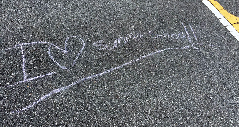 I love summer school written in chalk on the pavement