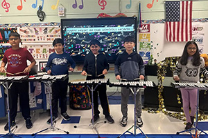 students playing xylophones